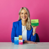 Dr Megan Rossi holding SMART STRAINS for your immune system