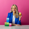 Dr Megan Rossi holding the Fussy Babies product