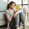 Young woman feeling ill, suffering from cold and flu
