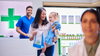 Image of mother and daughter carrying prescription of antibiotics from the pharmacy